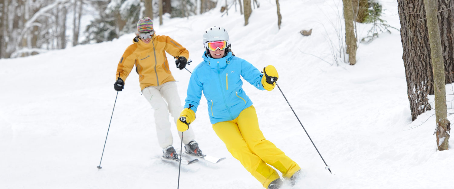 Skiers on trail