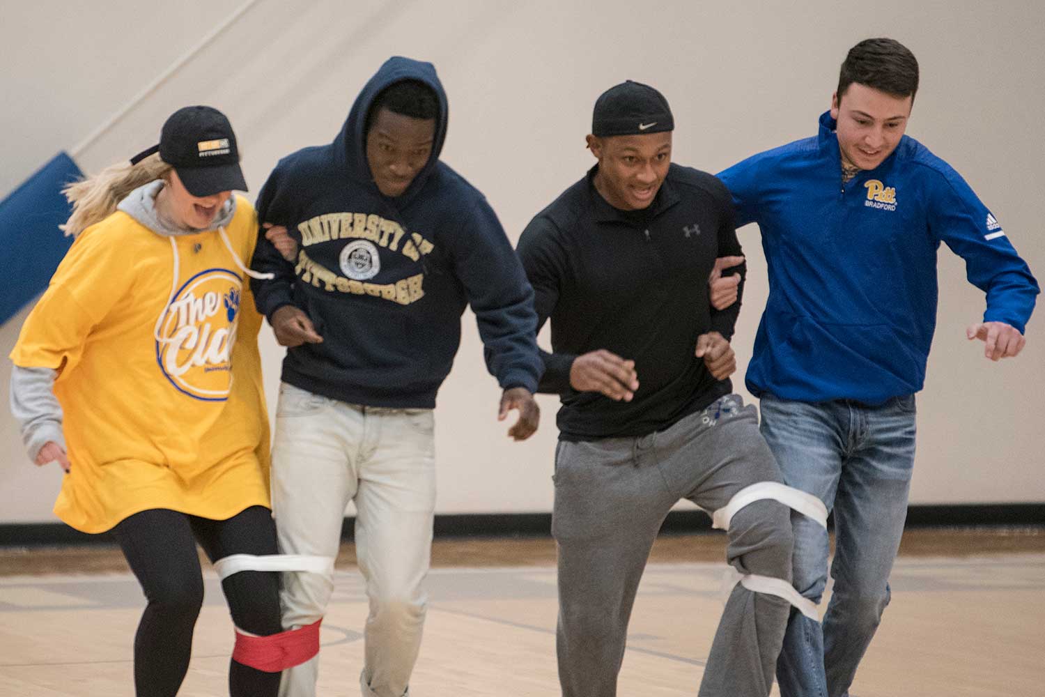 Students in three legged race