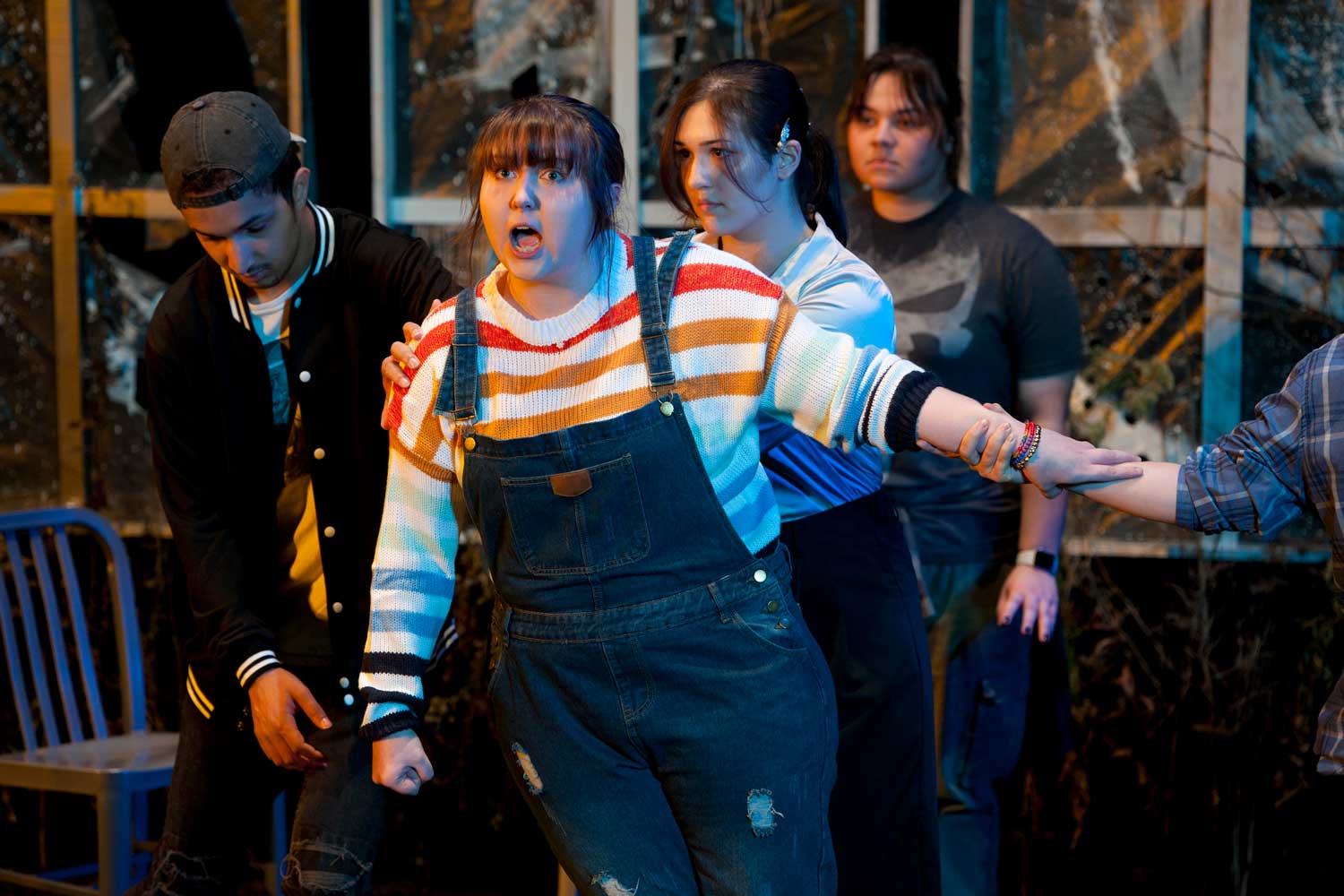 A group of students acting in a play