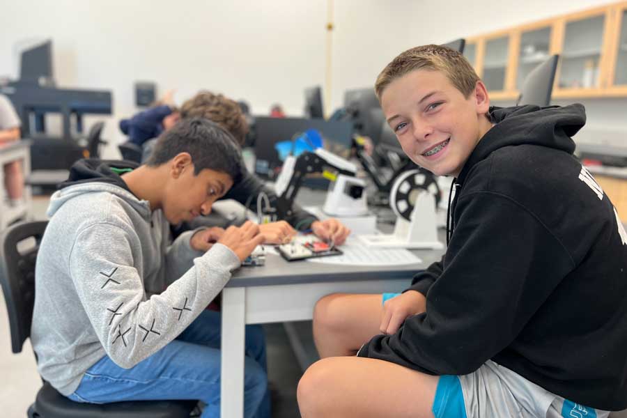 kids working during an engineering camp