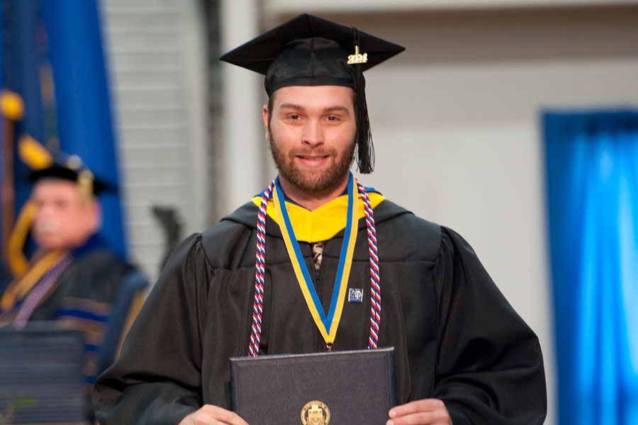 A graduation photo of Aiden Hulings at Commencement 2024