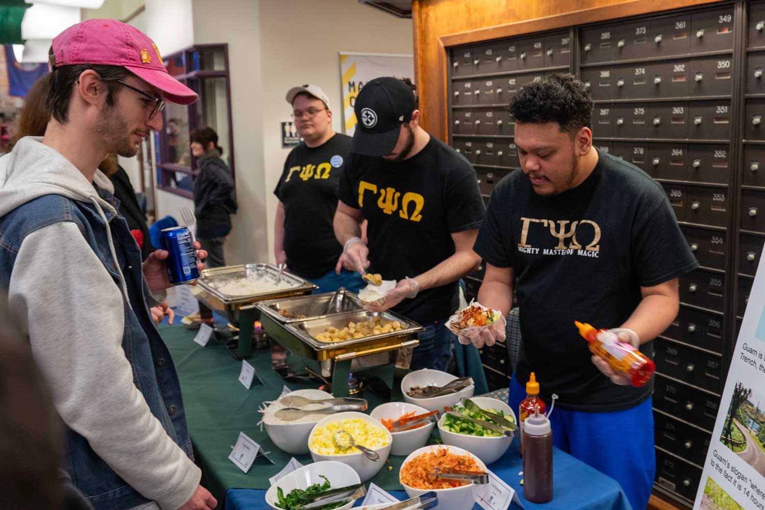 Students serving food from various countries