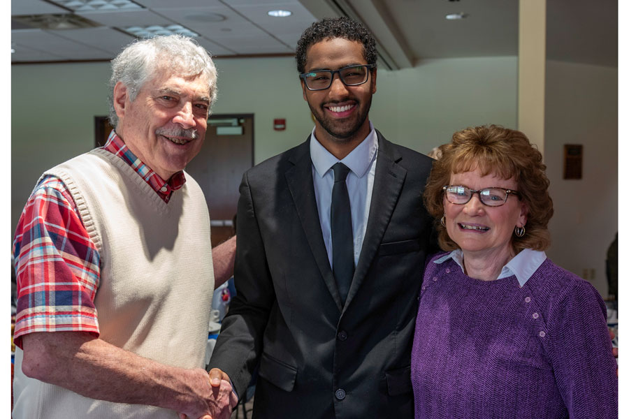 Zoal Awad with donors Rick and Cheryl Lutz