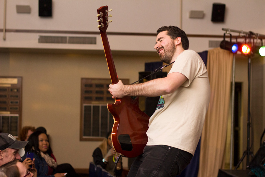 Staff playing guitar