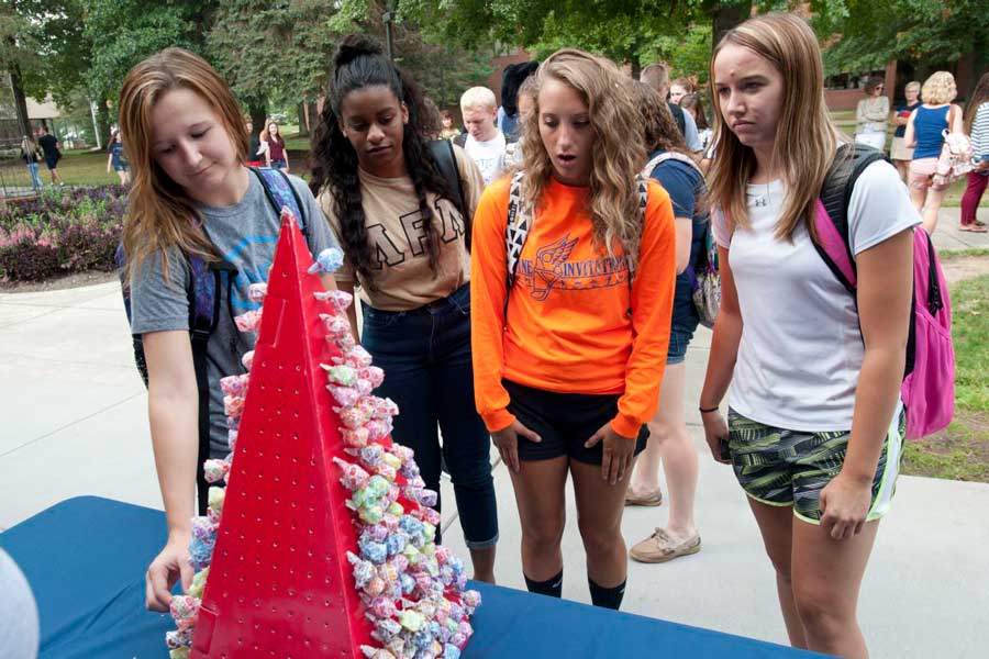 Students pick lollipops for a chance to win a prize