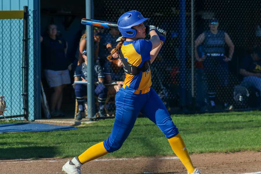 Photo of Megan Kapp playing softball