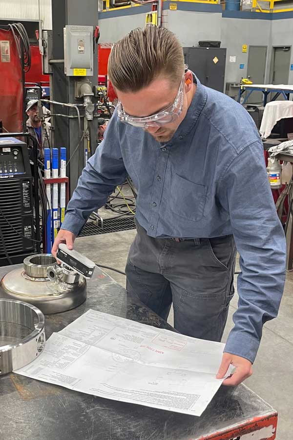 Nick Haner working in a machine shop