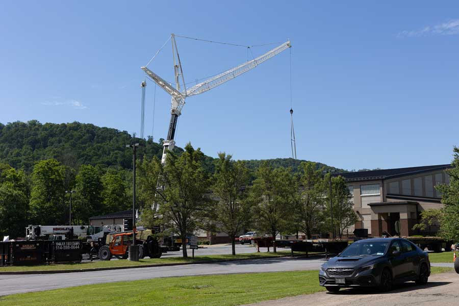 A crane overtop of the sport and fitness center