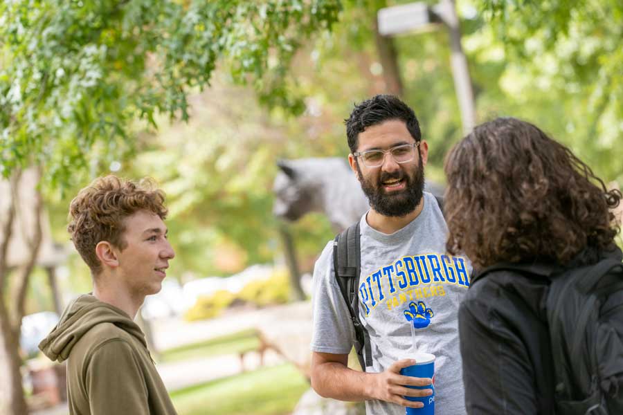 students talking in the quad