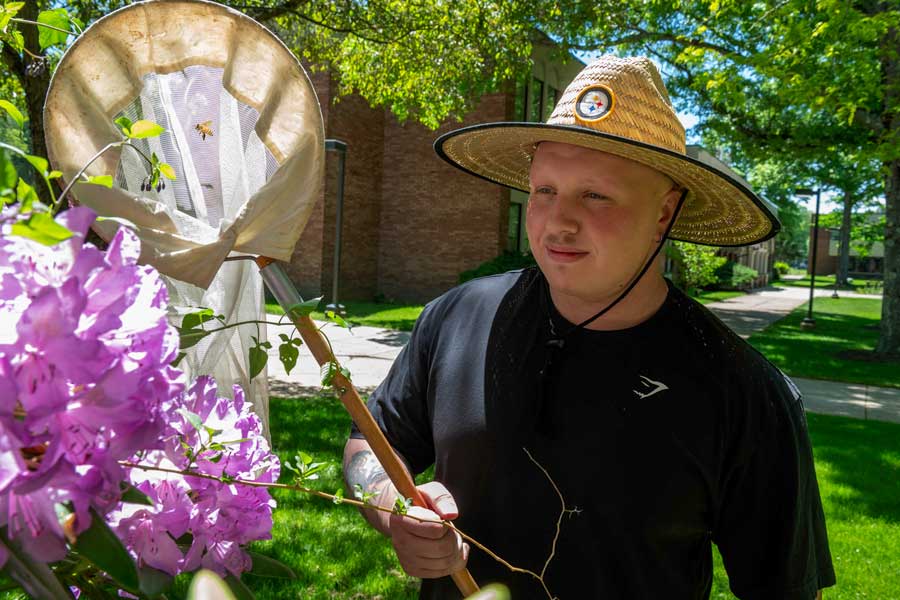 Aiden Minch-Hick, a pre-medicine student from Mingo Junction, Ohio, spent part of his summer capturing bees for the Pennsylvania Bee Monitoring Program.