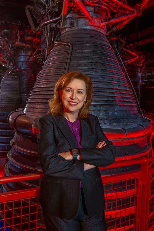 Margaret Weitekamp in front of a Sci-Fi prop