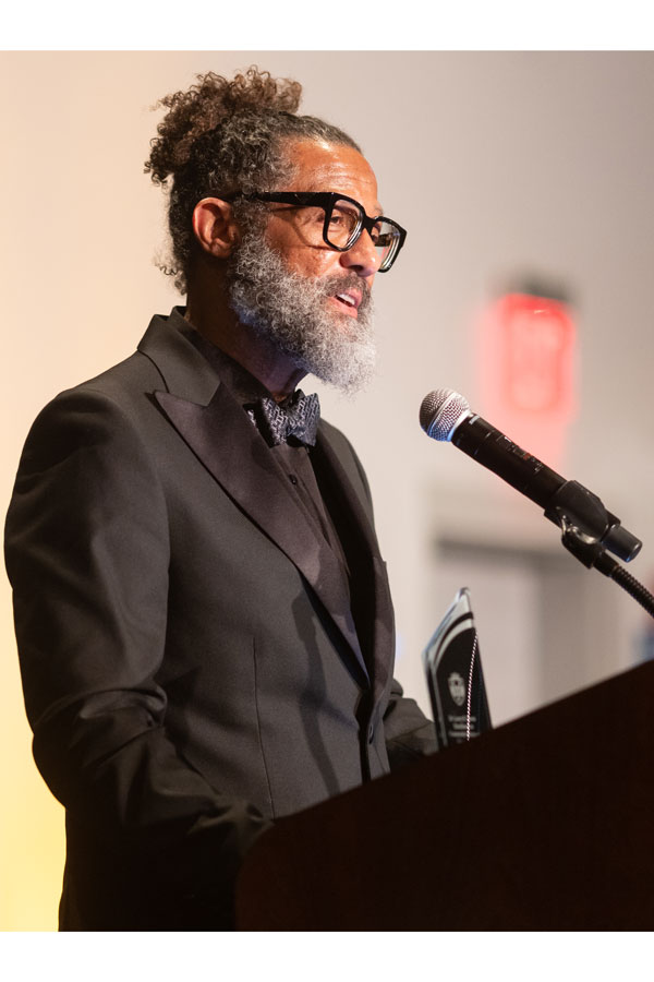 Dr. Tony Gaskew speaking at a podium