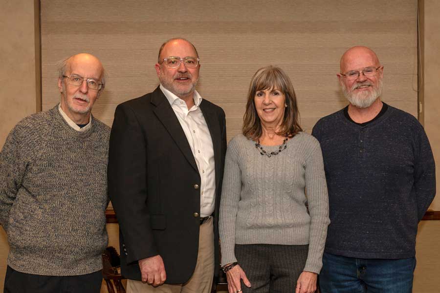 The longest-serving employees honored were, from left, Dr. David Soriano, 40 years, Bob Dilks, 35 years; Karen Strotman, 40 years; and Bill Kline, 41 years. Not pictured is Dr. Hashim Yousif, who has taught for 35 years. 