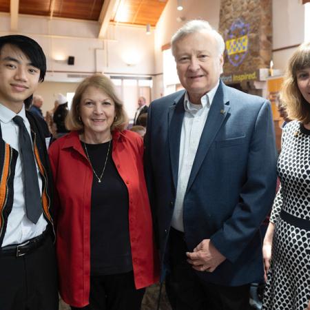Business management major Vince Vang with Cindy and John Jarzab and Christine Jarzab Kuntz