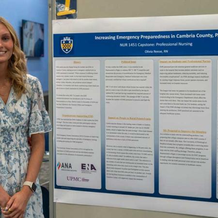 A student presenting her research about a nursing topic