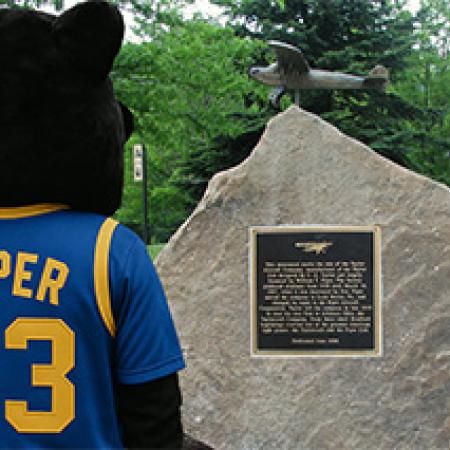 Panther mascot wearing a Pitt jersey with its new name Piper on the back.
